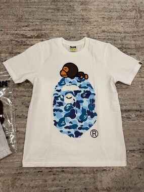 A Bathing Ape White Short Sleeve Tee with Signature Ape Graphic